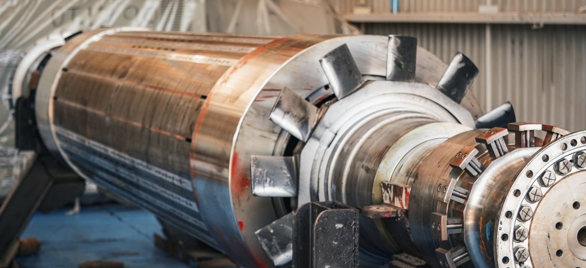 Large fabricated steel pressure vessel with a flanged end in a workshop, ready for non-destructive testing